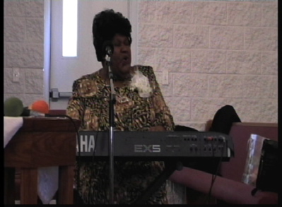 Sister Dorsey singing & playing piano